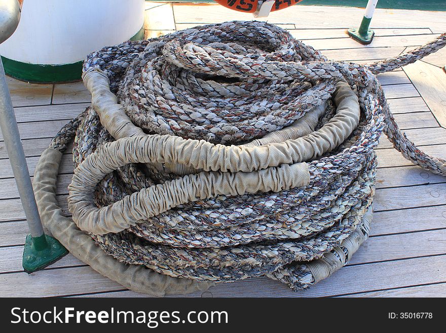 A rope coiled on the deck of a ship in Constanta, Romania. A rope coiled on the deck of a ship in Constanta, Romania.