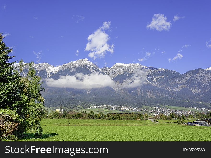 View of a valley in the Austrian Alps on a mild and sunny day in mid-October. View of a valley in the Austrian Alps on a mild and sunny day in mid-October.