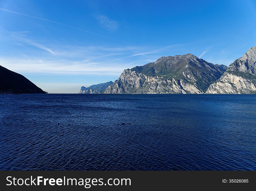 On a cold October morning the northern part of lake Garda in Italy resembles the fjords of Norway with its cold blue waters. On a cold October morning the northern part of lake Garda in Italy resembles the fjords of Norway with its cold blue waters.