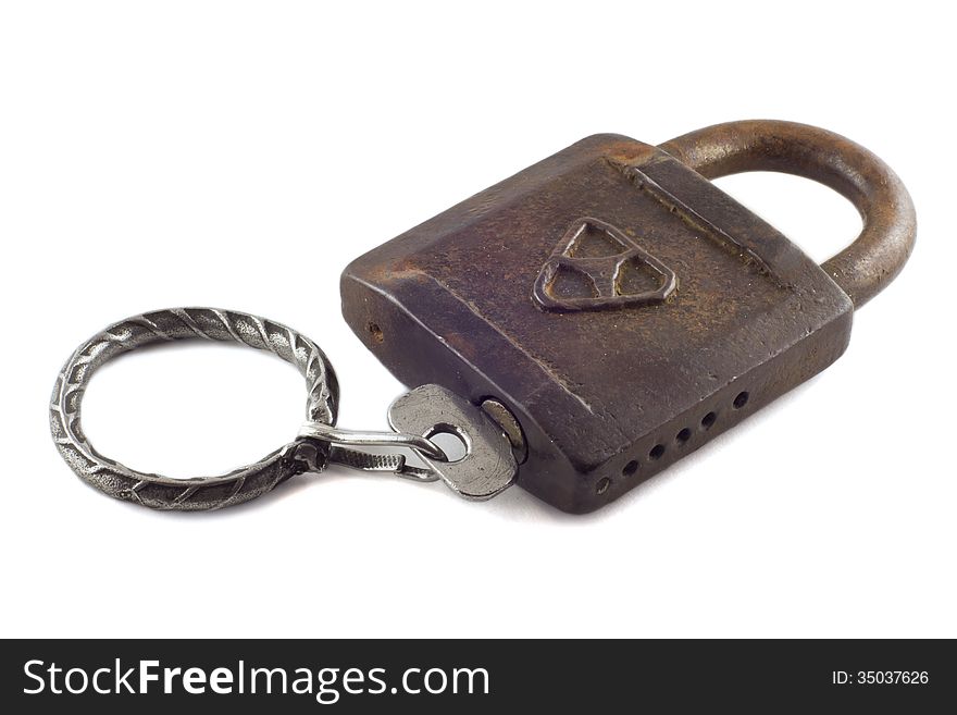 Old padlock with key