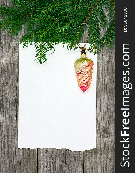Christmas card with vintage glass bauble on wooden background. Christmas card with vintage glass bauble on wooden background
