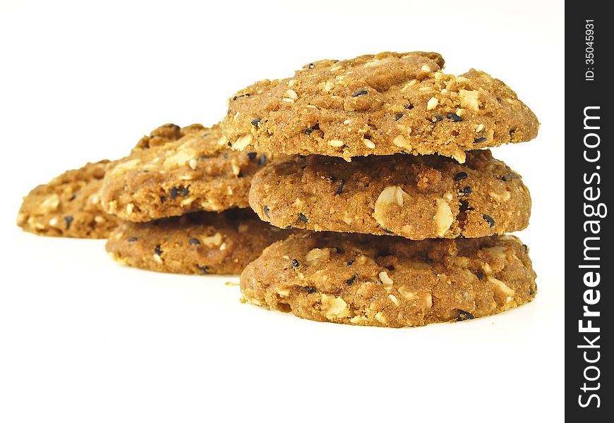 Step increase of stack whole grains cookies on white background. Step increase of stack whole grains cookies on white background