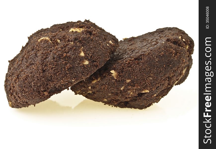 Slope pile of delicious brownie cookies on white background. Slope pile of delicious brownie cookies on white background