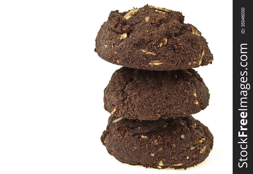 Tower stack of three brownie cookies on white background. Tower stack of three brownie cookies on white background