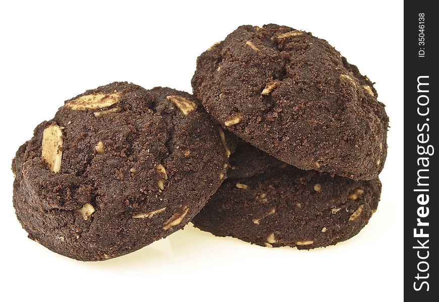 Triangle pile of brownie cookies on white background. Triangle pile of brownie cookies on white background