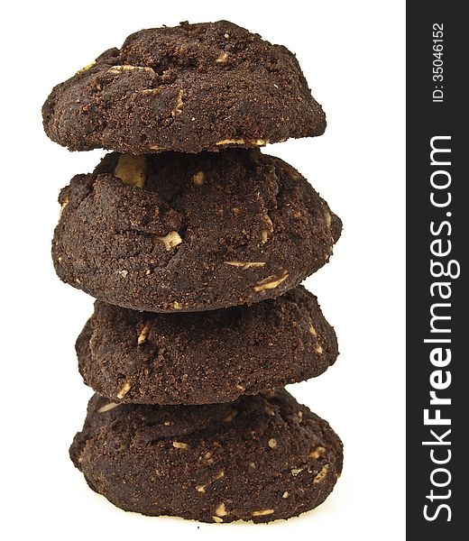 Tower stack of four brownie cookies on white background. Tower stack of four brownie cookies on white background