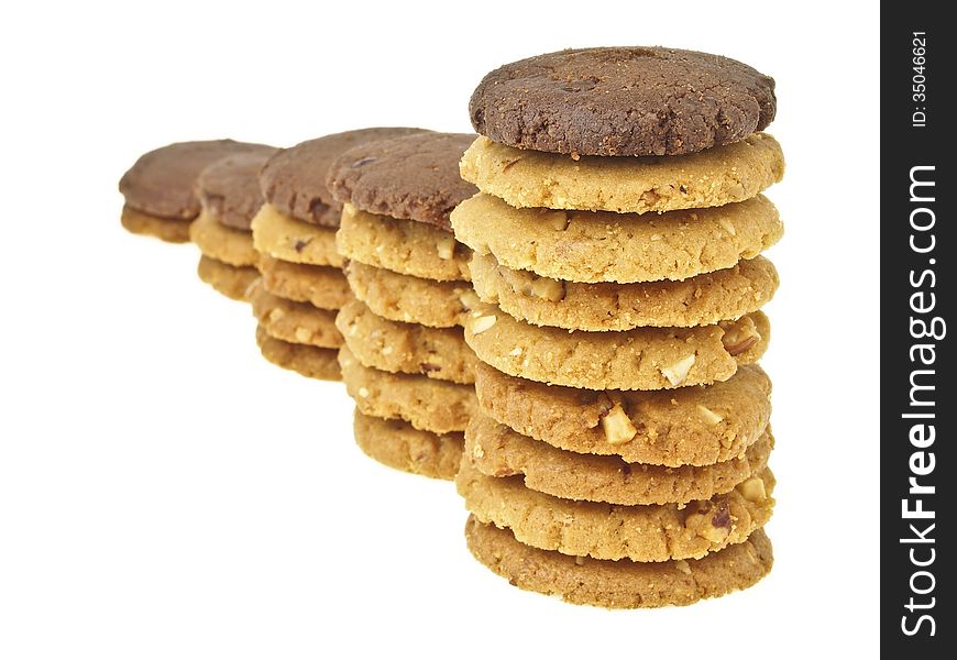 Step increase of cookie stack bar with brown cookie on top on white background. Step increase of cookie stack bar with brown cookie on top on white background