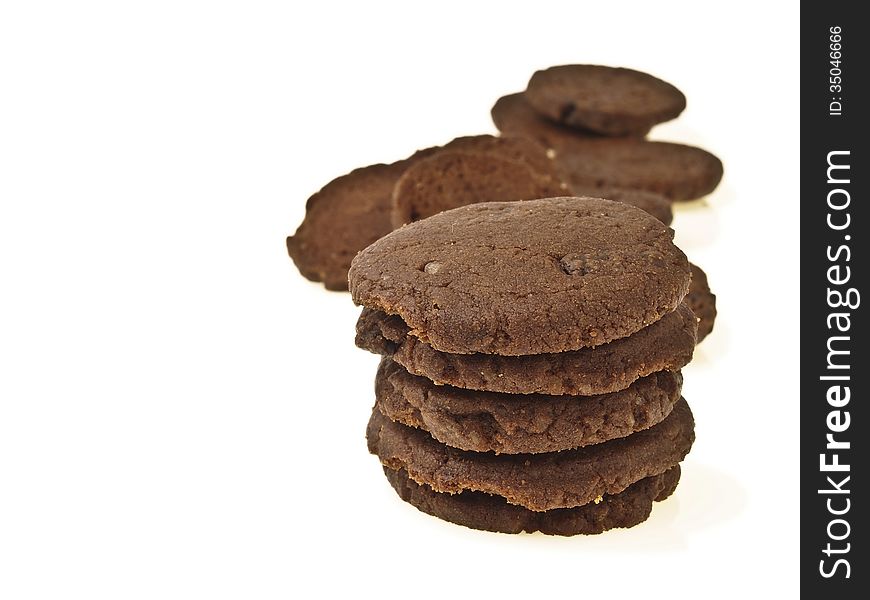 Pile of delicious chocolate cookie with space on white background