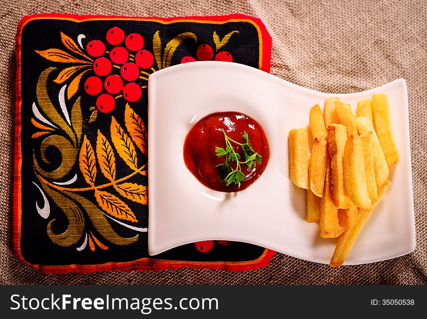 French Fries And Sauce Dish With Russian Kvass On Napkin