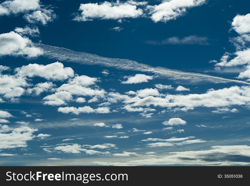 Blue sky with white clouds photo horizontal photo. Blue sky with white clouds photo horizontal photo