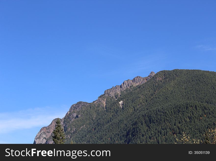 Mount Si on a sunny blue sky day near the town of North Bend, Washington. Mount Si on a sunny blue sky day near the town of North Bend, Washington.