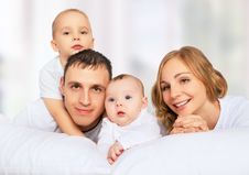 Happy Family Of Father, Mother And Children In White Bed Royalty Free Stock Photo Happy Family Of Father, Mother And Children In White Bed Royalty Free Stock Photo
