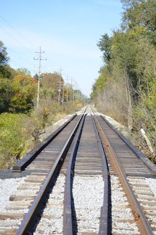 Railroad Tracks In The Country Royalty Free Stock Photo