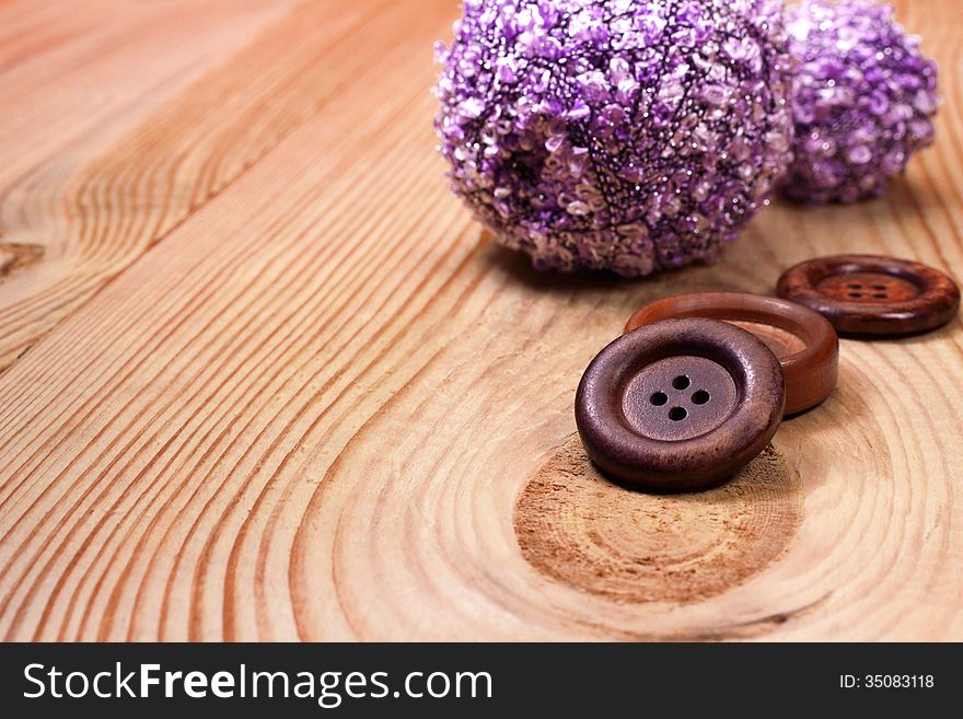 Old Wooden Buttons And A Ball Of Yarn