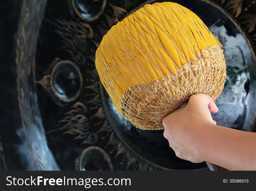 Hand Hit Big Gong In Temple