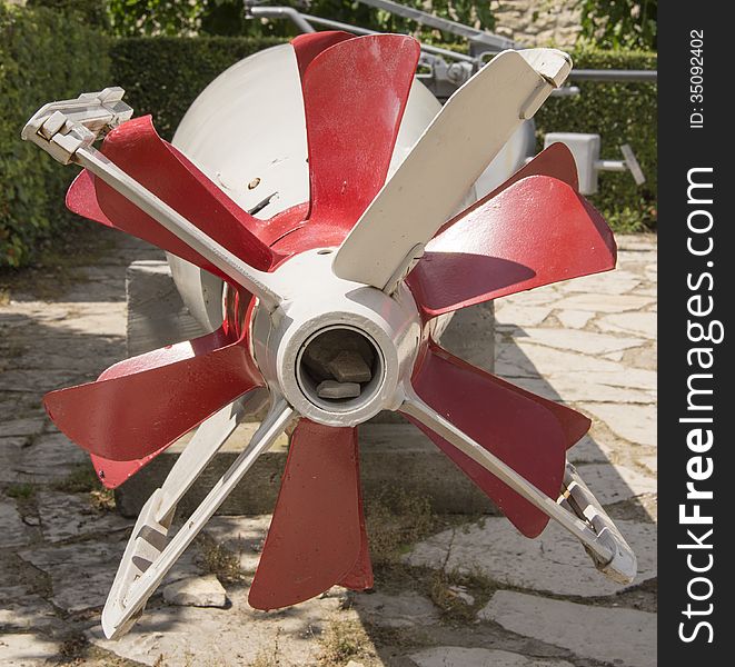 Red torpedo propeller close up