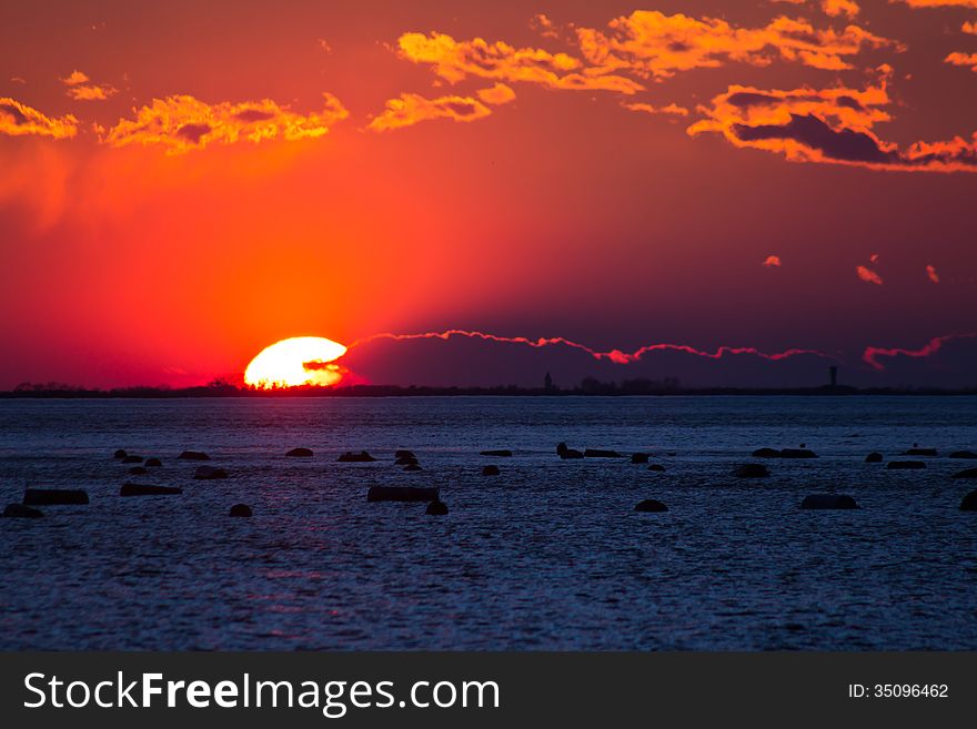 The sun goes down in the bay of Trieste. The sun goes down in the bay of Trieste