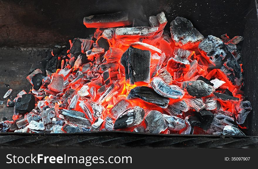 Coal burning. The red-hot charcoal barbecue.