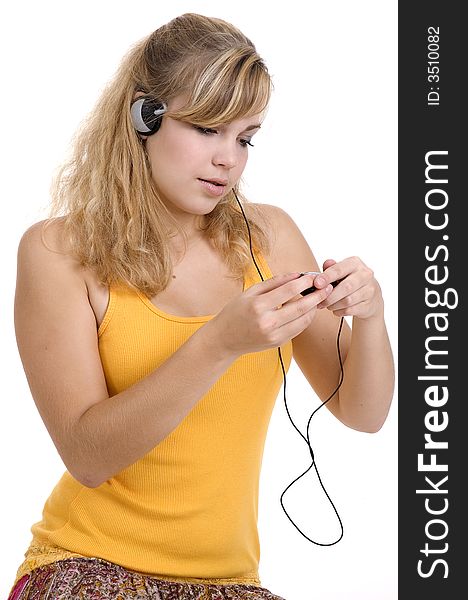 Teen girl fully enjoying her music. Teen girl fully enjoying her music