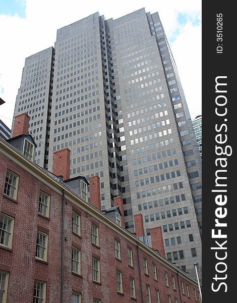 Modern skyscraper and colonial building in downtown New York city. Modern skyscraper and colonial building in downtown New York city