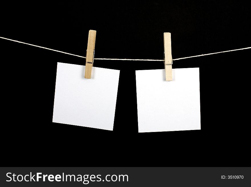 Note pads on af string attached to a clothesline. Note pads on af string attached to a clothesline