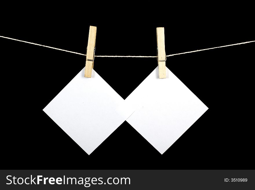 Note pads on af string attached to a clothesline. Note pads on af string attached to a clothesline
