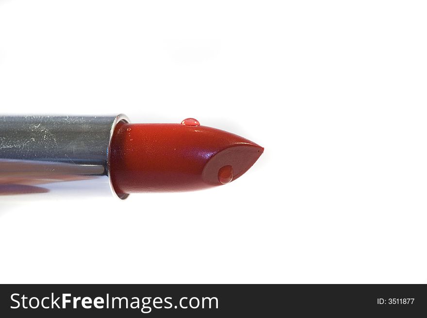 Red lipstick isolated on a white background