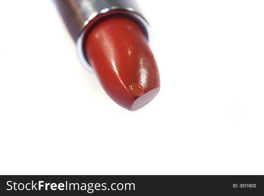 Red lipstick isolated on a white background