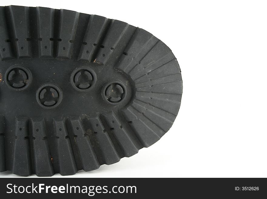 A Black Mens Shoe Sole on white background