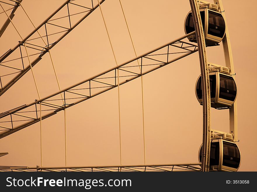 Ferris wheel close up sepia