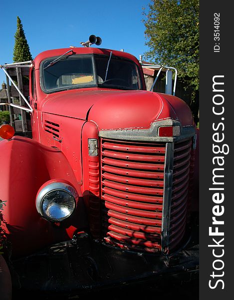 Old red vintage truck front