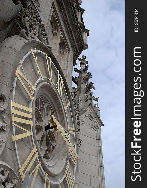 Ornamental clock on a town hall. Ornamental clock on a town hall