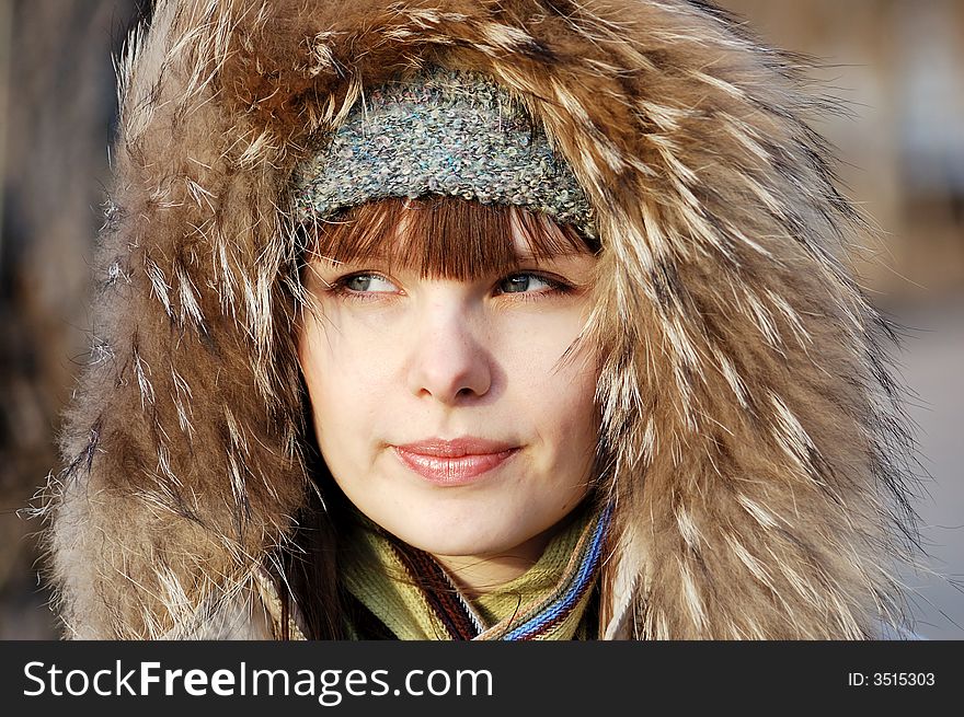 Beauty girl in fur, winter portrait