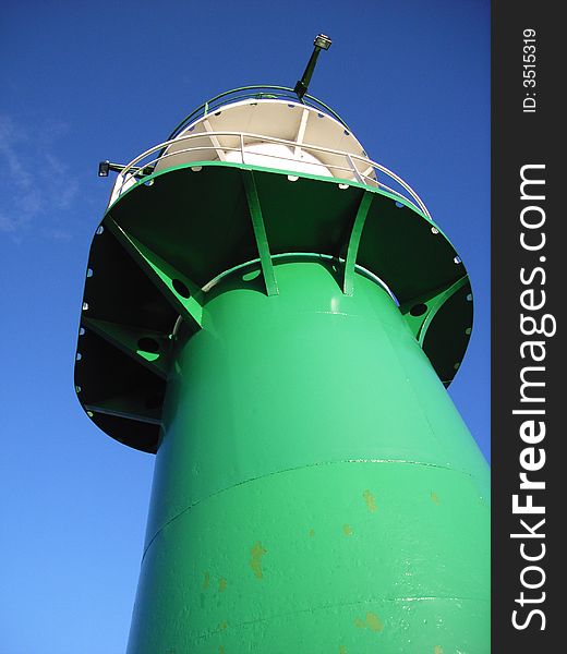 Light house at the port entrance of Rostock / Warnemunde. Light house at the port entrance of Rostock / Warnemunde