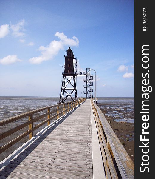 Light house in the wadden sea in the German North Sea. Light house in the wadden sea in the German North Sea