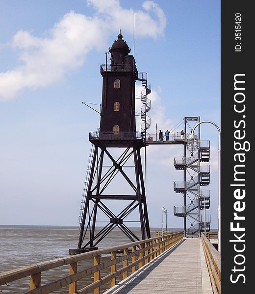 Light house in the wadden sea in the German North Sea. Light house in the wadden sea in the German North Sea