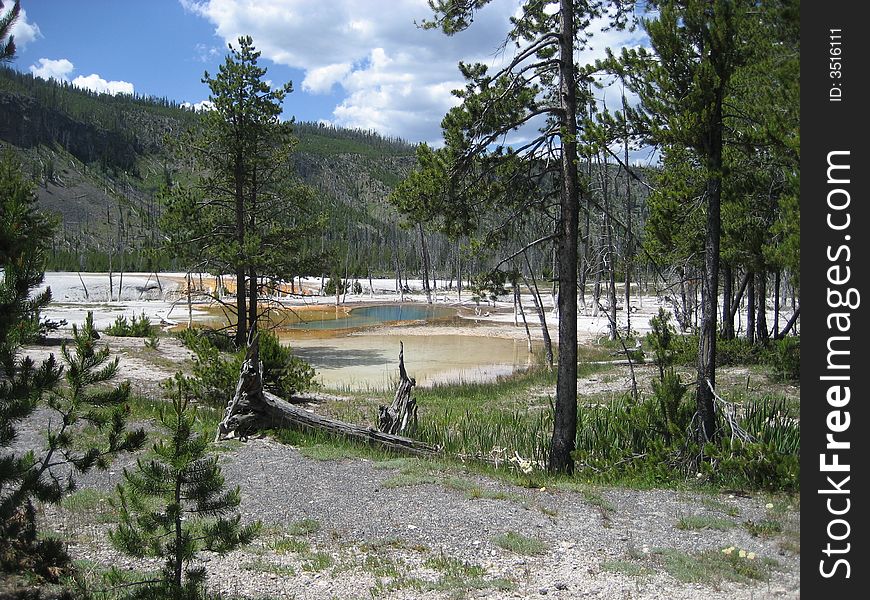 The Picture of Opalescent Pool was taken in Yellowstone National Park.