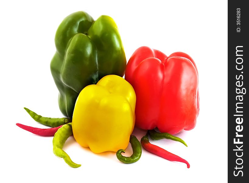 Red, yellow, green paprika and hot pepper, isolated on white background. Red, yellow, green paprika and hot pepper, isolated on white background