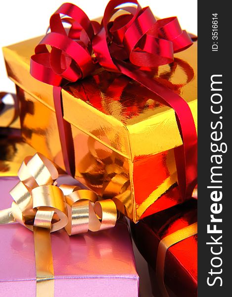 Christmas gifts wrapped with colorful ribbons