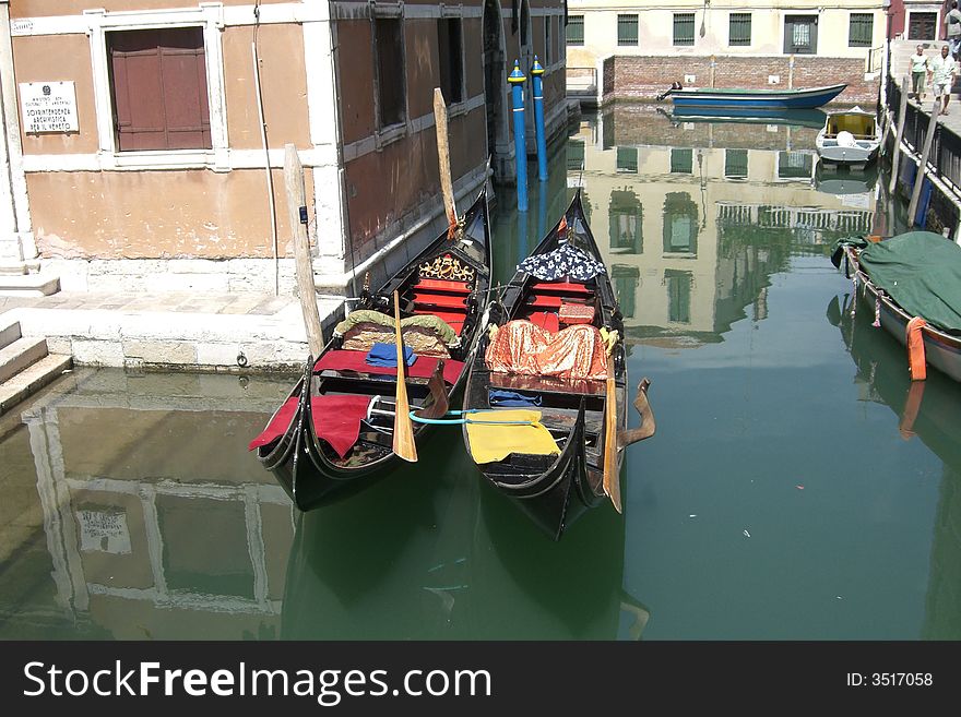 Two multicolor gondola in venice. Two multicolor gondola in venice