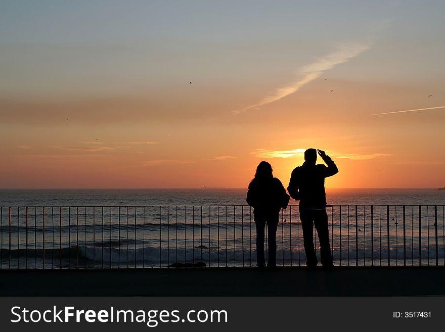 Couple silhouette in sunset