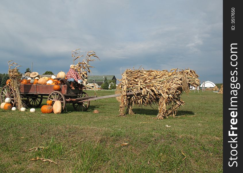 A wagon made up of many materials from the materials of the fall harvest. A wagon made up of many materials from the materials of the fall harvest.