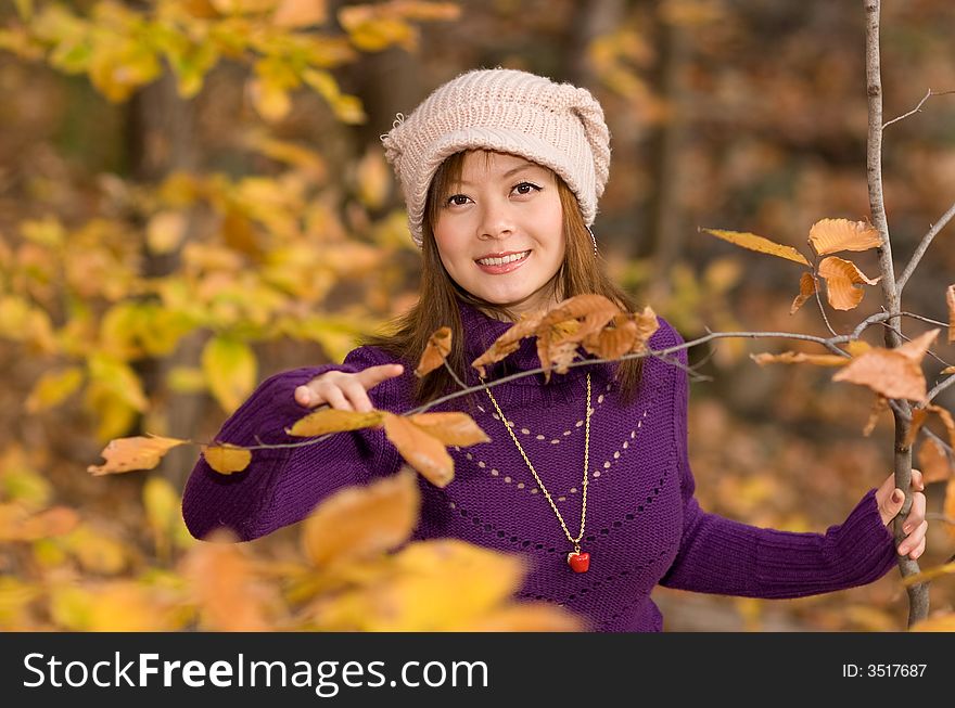 A girl wandering in woods in deep autumn. A girl wandering in woods in deep autumn