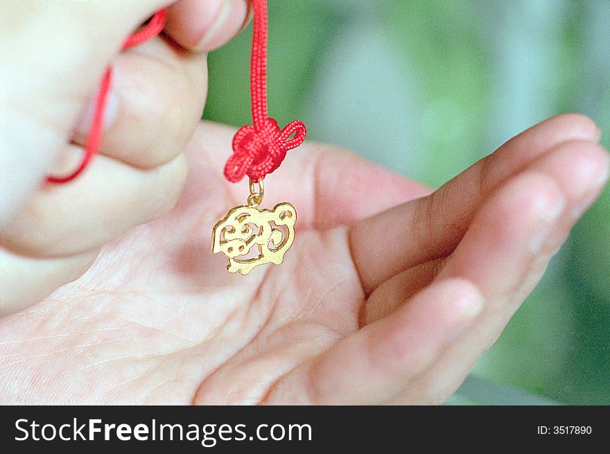 It is a gold pig with chinese knot. a chinese style gife,
See more my images at :) http://www.dreamstime.com/Eprom_info. It is a gold pig with chinese knot. a chinese style gife,
See more my images at :) http://www.dreamstime.com/Eprom_info