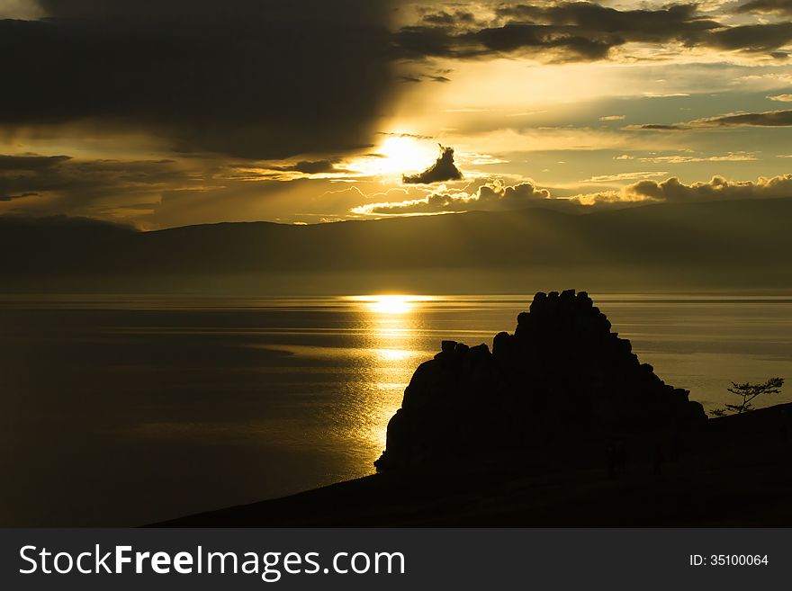 Baikal National Park - Cape Burhan (Shaman Rock), one of the nine holy places of Asia. Baikal National Park - Cape Burhan (Shaman Rock), one of the nine holy places of Asia