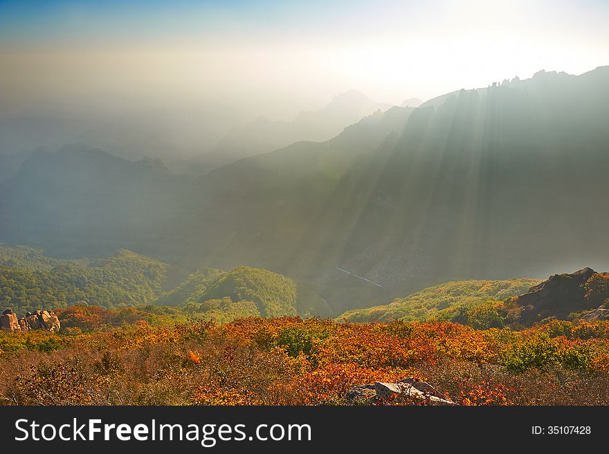 The photo taken in Chinas Hebei province qinhuangdao city,Zu mountain scenic spot.The time is October 3, 2013.Overlook hills from the Apsara peak of Zu mountain. The photo taken in Chinas Hebei province qinhuangdao city,Zu mountain scenic spot.The time is October 3, 2013.Overlook hills from the Apsara peak of Zu mountain.