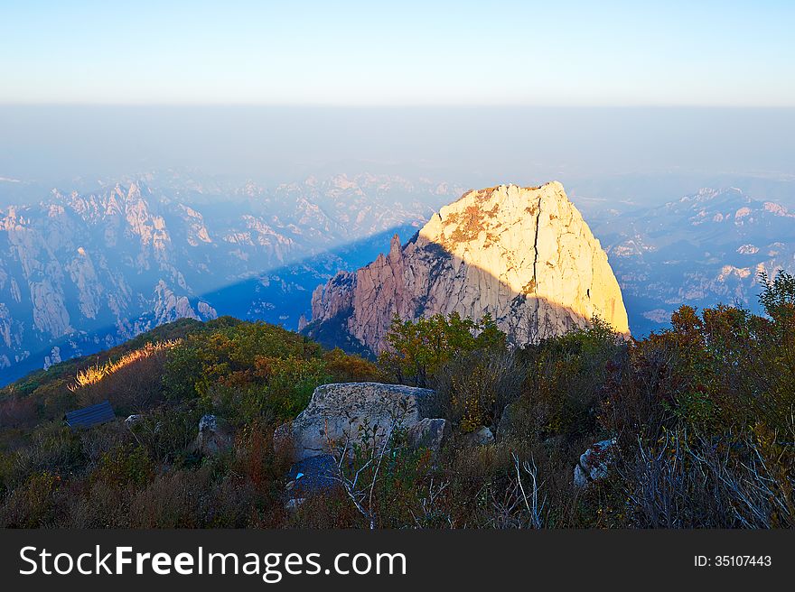 The photo taken in Chinas Hebei province qinhuangdao city,Zu mountain scenic spot.The time is October 3, 2013.Overlook hills from the Apsara peak of Zu mountain. The photo taken in Chinas Hebei province qinhuangdao city,Zu mountain scenic spot.The time is October 3, 2013.Overlook hills from the Apsara peak of Zu mountain.