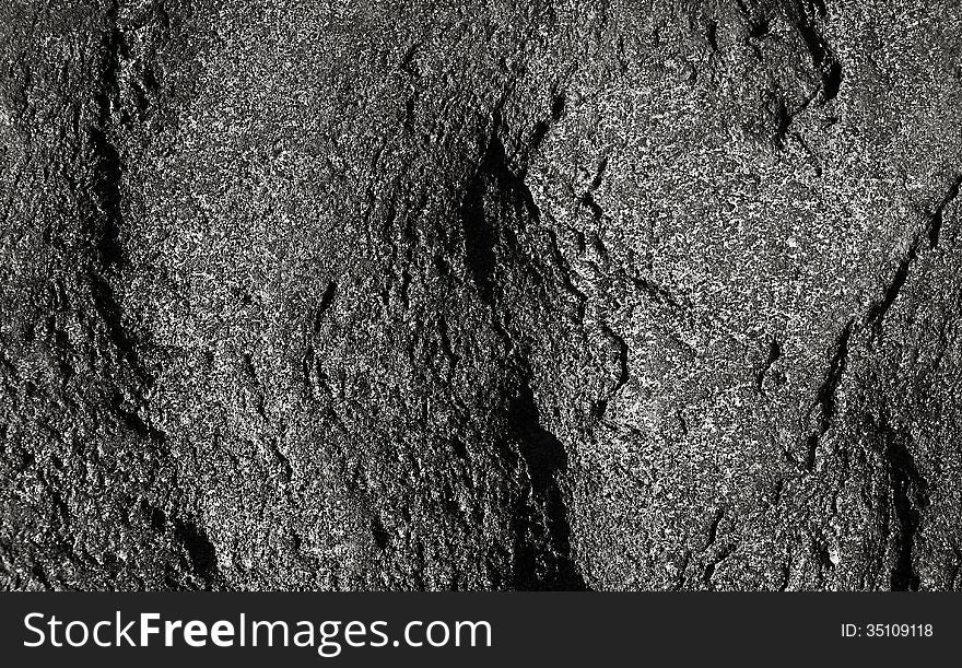 Rural stone with texture and patterns in outdoor scene. Rural stone with texture and patterns in outdoor scene