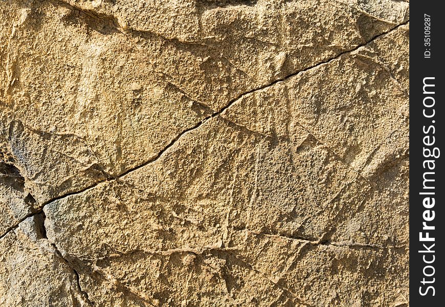 Detailed cracked sand wall background