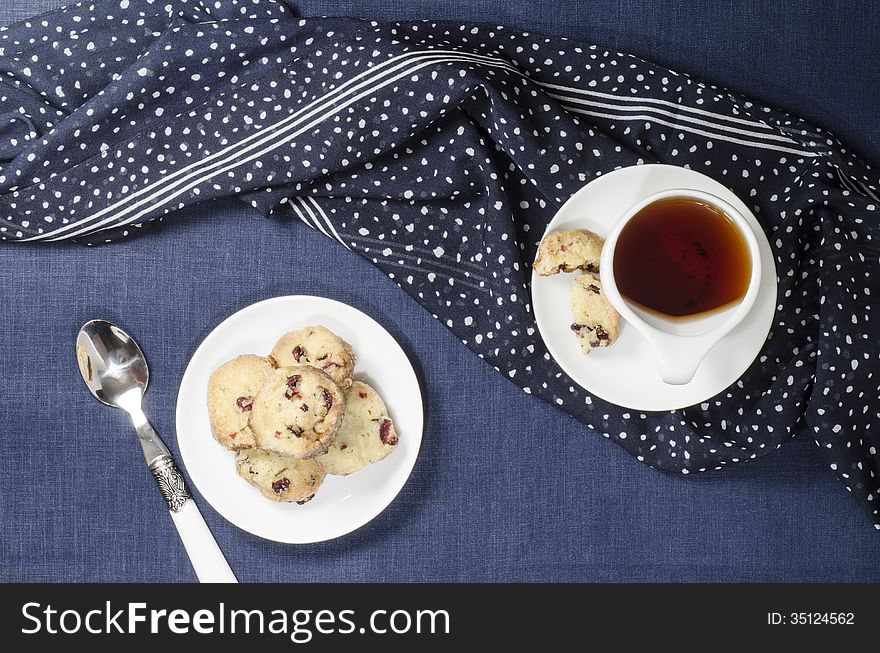 Porcelain Dishes And Cookies With Cranberries